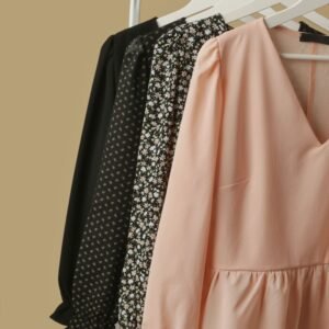 ​WOMEN'S LONG-SLEEVE BLOUSE -  PREMIUM QUALITY - 44 LB BALE OF FOLDED CLOTHES.